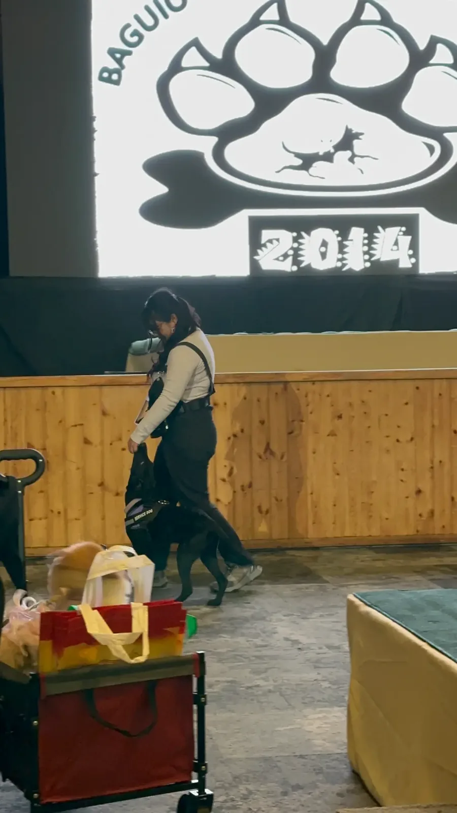 A working dog demonstration in progress in the convention hall.